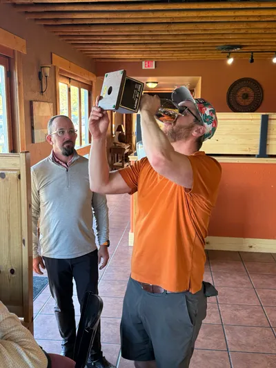 Kovner drinks from the cup